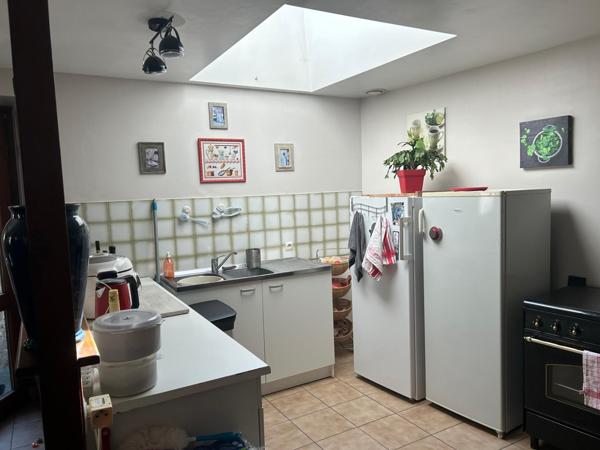 IMMEUBLE, COMMERCE ET APPARTEMENT AVEC JARDIN