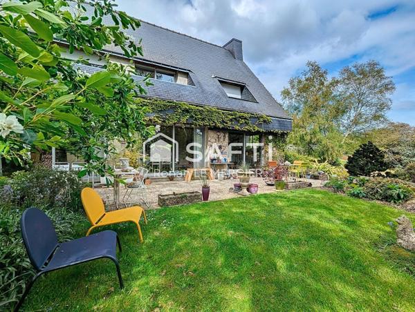 Jolie maison dans un magnifique parc paysager