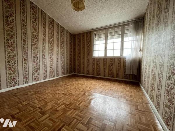 BETHUNE - Maison semi mitoyenne de 1971 - 4 chambres - 102 m² habitables 