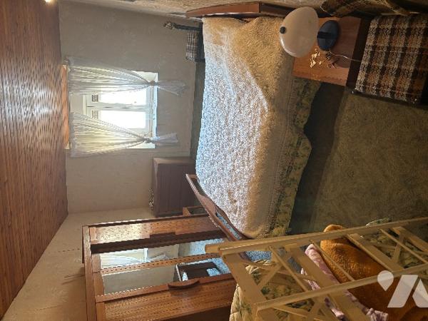 Charmante maison de village avec terrain et garage.