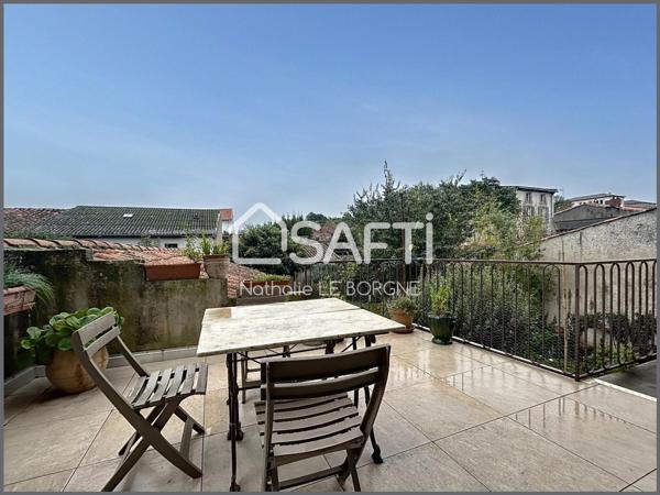 Maison de ville avec jardin / garage / local pro