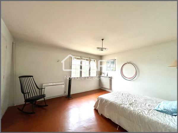 Maison de ville avec jardin / garage / local pro