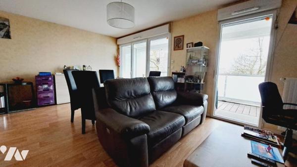 Appartement T3 - 64 m² avec balcon et parking privatif couvert 