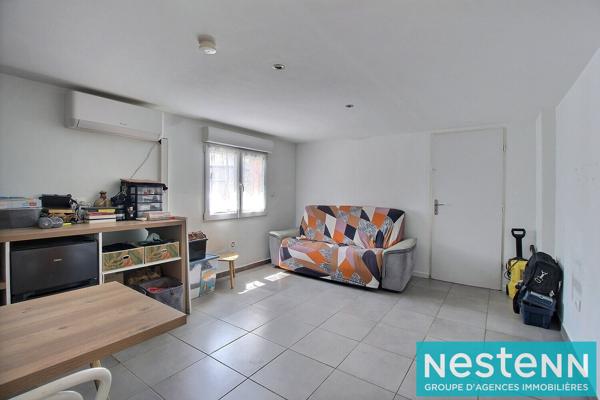 Maison 5 pièces de plain-pied avec studio indépendant et jardin arboré 69330 MEYZIEU