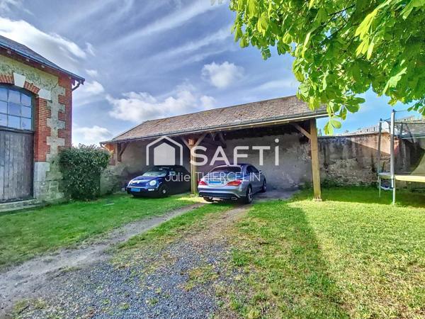 Beaucoup de cachet pour cette maison avec dépendances