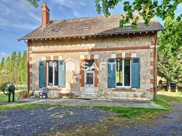 Beaucoup de cachet pour cette maison avec dépendances