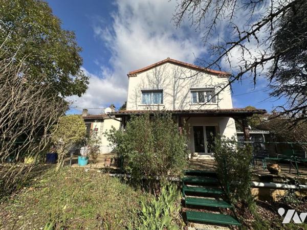 Maison de centre-ville avec piscine et garage