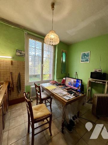 Maison ancienne au cœur de Merville avec garage et jardin clos