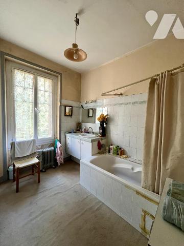 Maison ancienne au cœur de Merville avec garage et jardin clos