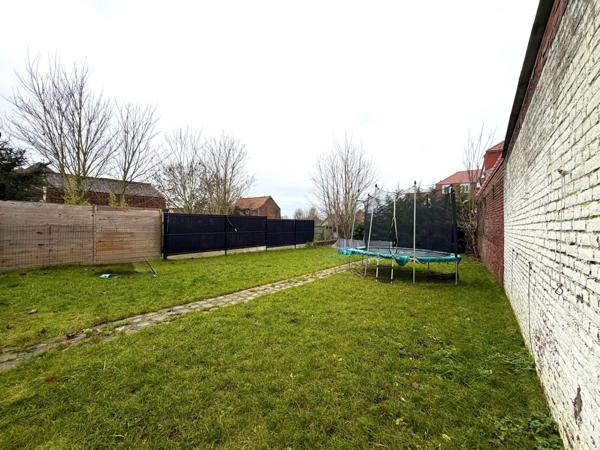 Maison de 185m², 4 chambres et jardin.