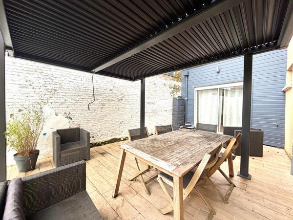 Maison de 185m², 4 chambres et jardin.