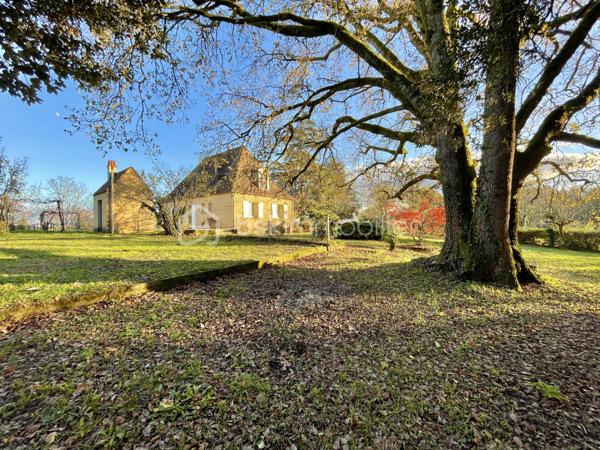 En exclusivité sur le secteur de Lalinde, cette superbe maison construite en pierre de taille, de style Périgourdin, située sur le secteur de Lalinde. Avec ses 120 m² habitables, cette propriété, bâtie dans les années 70, a été soigneusement entretenue.
Edifiée en position dominante sur un grand terrain clos de 8232 m², elle bénéficie d’une vue dégagée, garantissant tranquillité et intimité sans vis-à-vis. De plus, cette parcelle est entièrement constructible, avec la possibilité de créer un accès indépendant pour différents projets.
Pour les amateurs d’espaces généreux, une parcelle agricole de 24000 m² est également disponible à la vente en supplément, offrant une opportunité unique pour les passionnés de nature ou d’agriculture.

Description de la maison :
- Hall d’entrée avec placard
- Cuisine séparée et équipée de 13 m²
- Séjour lumineux orienté plein sud de 33 m² avec cheminée à insert
- Deux chambres de 10 m² et 15 m² avec parquet, dont une avec accès direct à l’extérieur
- WC séparé et coin lavabo

À l’étage :
- Deux chambres de 12 m² avec parquet et stores électriques
- Salle de bain avec placard

Confort :
- Menuiseries double vitrage PVC (sauf dans le séjour et la porte d'entrée en double vitrage bois)
-Volets battants bois et stores électriques à l'étage.
- Chauffage central et eau chaude via pompe à chaleur (installation de 2020) et chaudière au fuel (2010) en soutien pour les périodes de grand froid.
- Portail automatique en PVC.
- Fibre
- Assainissement individuel non conforme.

Extérieur :
- Grande terrasse de 45 m² plus contournement de la maison offrant un accès pratique aux différents espaces extérieurs.
- Portail automatique en PVC, accès et parking en enrobé
- Local technique pour pompe à chaleur et chaudière au fuel
- Pigeonnier avec cave enterrée
- Plusieurs dépendances : garage, box de jardin, buanderie, cave, bergerie, atelier, et bûcher complètent cette propriété.

Disponible à la visite 7 jours sur 7, n'hésitez pas à venir découvrir ce bien unique à votre convenance.
Collaboration entre professionnels de l'immobilier OK.

To seize exclusively on the sector of Lalinde, this superb house built in stone, Perigord style, located in the heart of the popular area of Lalinde. With its 120 m2 of living space, this property, built in the 70s, has been carefully maintained.
Built in a dominant position on a large enclosed plot of 8232 m 2, it enjoys an unobstructed view, guaranteeing tranquility and privacy without vis-à-vis. In addition, this plot is fully constructible, with the possibility of creating independent access for different projects.
For lovers of generous spaces, an agricultural plot of 24000 m2 is also available for sale as an additional charge, offering a unique opportunity for nature or agriculture enthusiasts.

Description of the house:
- Entrance hall with cupboard
- Separate and equipped kitchen of 13 m 2
- Bright living room facing south of 33 m2 with fireplace insert
- Two bedrooms of 10 m2 and 15 m2 with wooden floors, one with direct access to the outside
- Separate toilet and sink area

Upstairs:
- Two bedrooms of 12 m2 with wooden floors and electric blinds
- Bathroom with closet

Comfort:
- PVC double glazed joinery (except in the living room and the entrance door in wood double glazing)
-Wooden shutters and electric blinds on the floor.
- Central heating and hot water via heat pump (installation from 2020) and oil-fired boiler (2010) in support for periods of extreme cold.
- Automatic gate in PVC.
- Fiber
- Non-compliant individual sanitation.

Exterior:
- Large terrace of 45 m2 plus bypass of the house offering convenient access to various outdoor spaces.
- Automatic PVC gate, access and parking in asphalt
- Technical room for heat pump and oil boiler
- Dovecote with underground cellar
- Several outbuildings: garage, garden box, laundry room, cellar, barn, workshop, and woodshed complete this property.

Available to visit 7 days a week, do not hesitate to come and discover this unique property at your convenience.