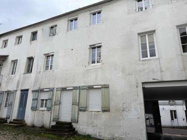 58 m2 Appartement 3 pièces + cuisine plein centre DPE D