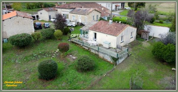 Propriété avec maison d'habitation + nombreuses dépendances + grand terrain