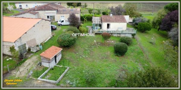 Propriété avec maison d'habitation + nombreuses dépendances + grand terrain