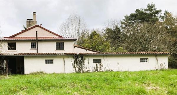Propriété de 2 maisons, au coeur de 40 Ha de forêts et prairies