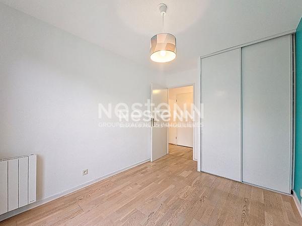 Morangis 3 pièces en rez-de-jardin avec extérieur et garage-double