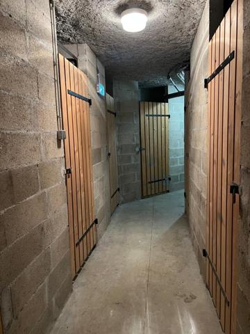 T2 lumineux avec double garage et cave