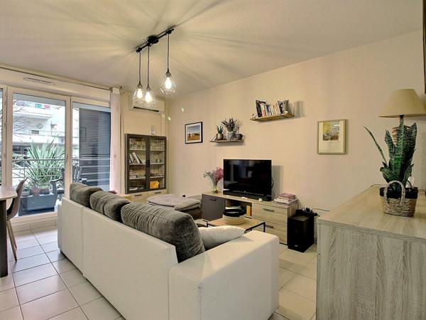 T3 d'environ 65m² en rez-de-chaussée avec terrasse et parking - Résidence sécurisée