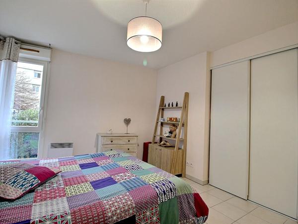 T3 d'environ 65m² en rez-de-chaussée avec terrasse et parking - Résidence sécurisée