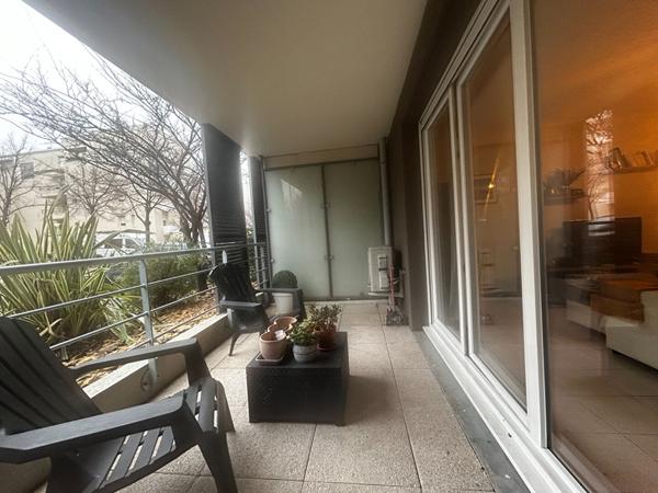 T3 d'environ 65m² en rez-de-chaussée avec terrasse et parking - Résidence sécurisée