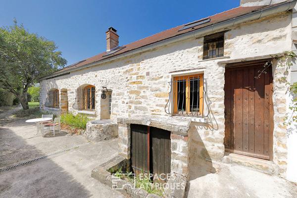 Maison en pierre avec un généreux jardin et ses arbres fruitiers