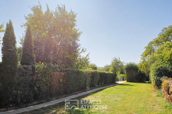 Maison en pierre avec un généreux jardin et ses arbres fruitiers