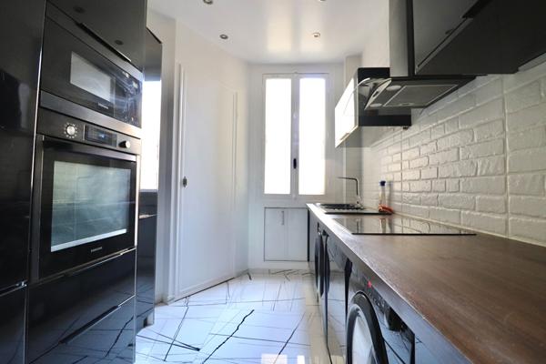 Appartement 102 m2 Loué nu - Paris 14 - 5 pièces 102.01 m2