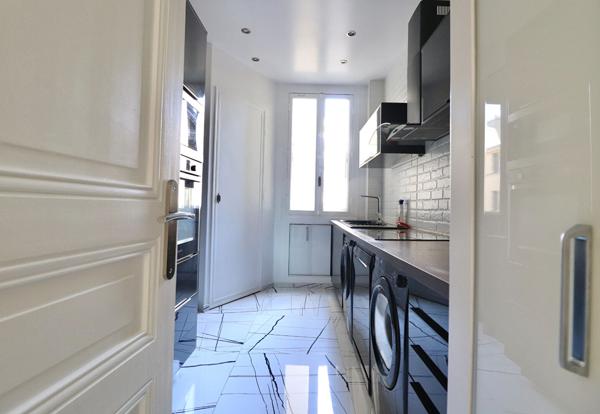 Appartement 102 m2 Loué nu - Paris 14 - 5 pièces 102.01 m2