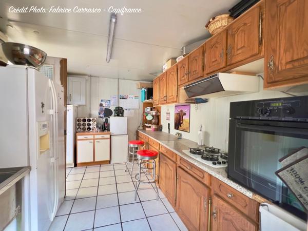 Maison à vendre 6 pièces GERZAT (63) Centre-ville Maison familiale de caractère de 145 m² avec terrasse, toit-terrasse, cuisine d'été, garage et cave voûtée
