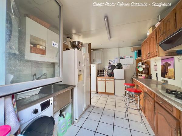 Maison à vendre 6 pièces GERZAT (63) Centre-ville Maison familiale de caractère de 145 m² avec terrasse, toit-terrasse, cuisine d'été, garage et cave voûtée