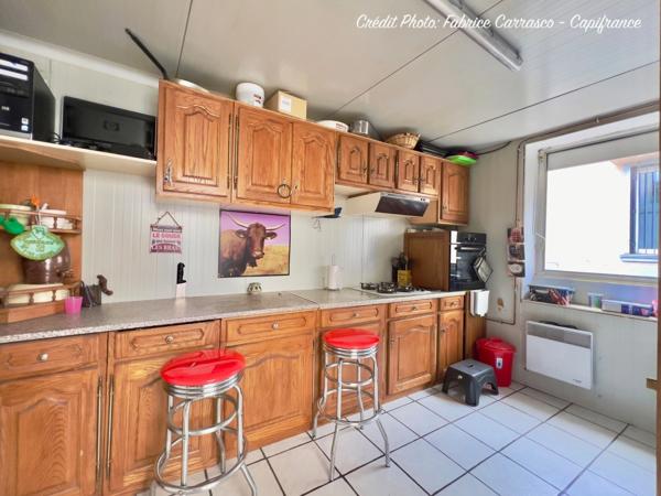 Maison à vendre 6 pièces GERZAT (63) Centre-ville Maison familiale de caractère de 145 m² avec terrasse, toit-terrasse, cuisine d'été, garage et cave voûtée