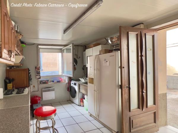 Maison à vendre 6 pièces GERZAT (63) Centre-ville Maison familiale de caractère de 145 m² avec terrasse, toit-terrasse, cuisine d'été, garage et cave voûtée