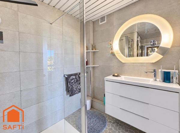 Superbe appartement avec terrasses, 2 caves et garage