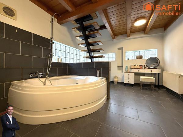 Superbe maison atypique de 3 pièces disposant d'une terrasse, d'un jardin et d'un parking !