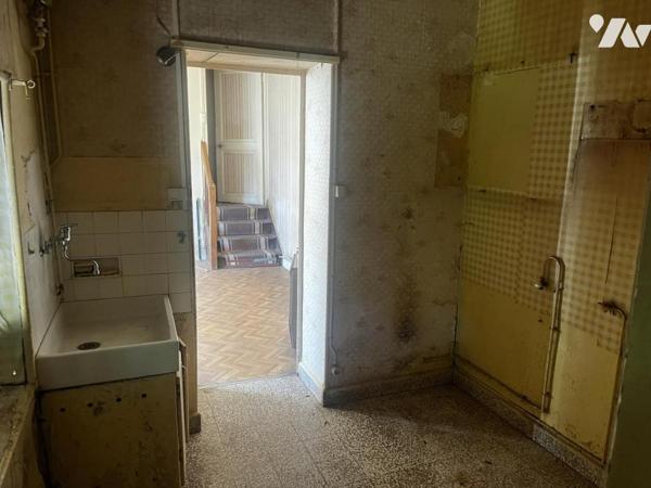 Maison mitoyenne à rénover