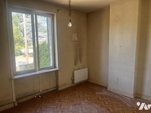 Maison mitoyenne à rénover