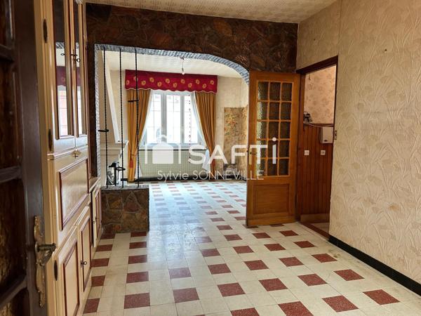 Maison mitoyenne avec potentiel et cachet