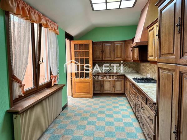 Maison mitoyenne avec potentiel et cachet