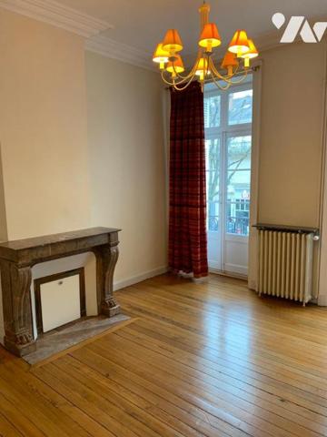 Bel appartement T4 de 95 m2 avec balcon, jardin et 2 caves