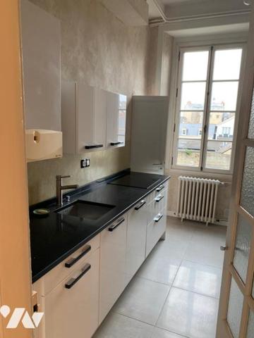 Bel appartement T4 de 95 m2 avec balcon, jardin et 2 caves