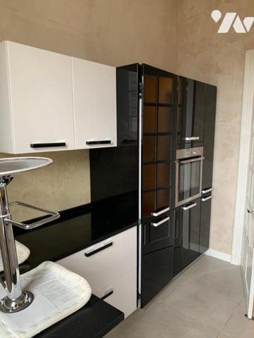 Bel appartement T4 de 95 m2 avec balcon, jardin et 2 caves