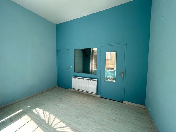 Charmante maison de ville avec local commercial en RDC (vide) dans le centre de Malicorne Sur Sarthe