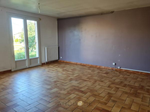 Maison avec garage et jardin clos dans quartier recherché !