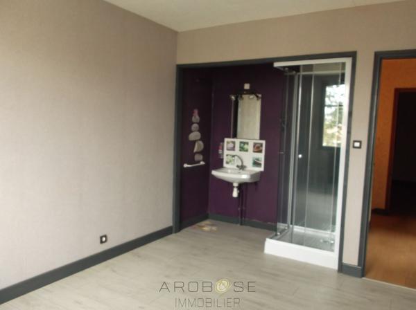 Maison avec garage et jardin clos dans quartier recherché !