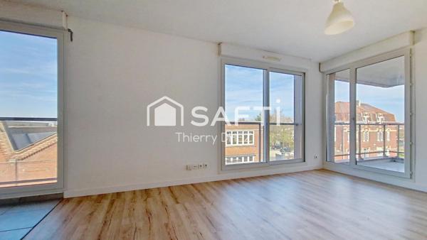 Tourcoing proximité Mouvaux, T2 lumineux de 49m² avec balcon et place de parking en sous-sol