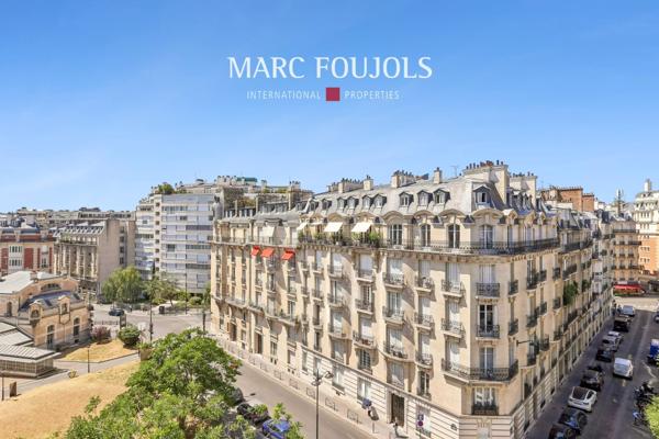 Paris XVI Passy : appartement en étale élevé avec balcons et vue dégagée