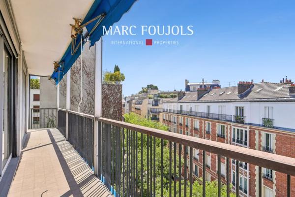 Paris XVI Passy : appartement en étale élevé avec balcons et vue dégagée