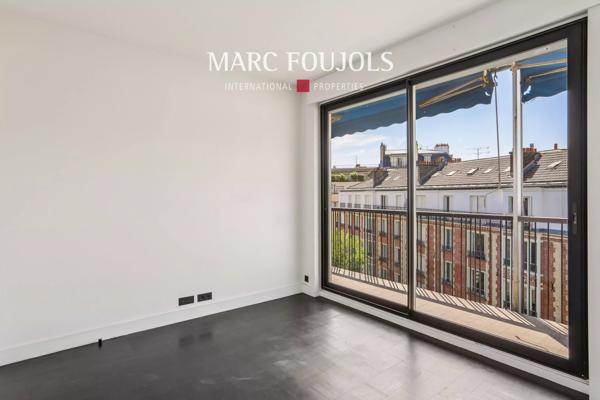 Paris XVI Passy : appartement en étale élevé avec balcons et vue dégagée