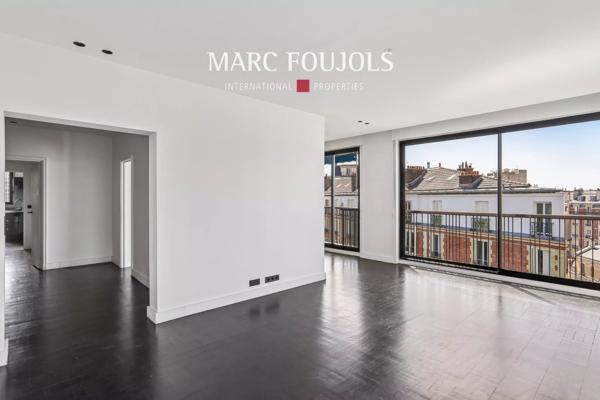 Paris XVI Passy : appartement en étale élevé avec balcons et vue dégagée